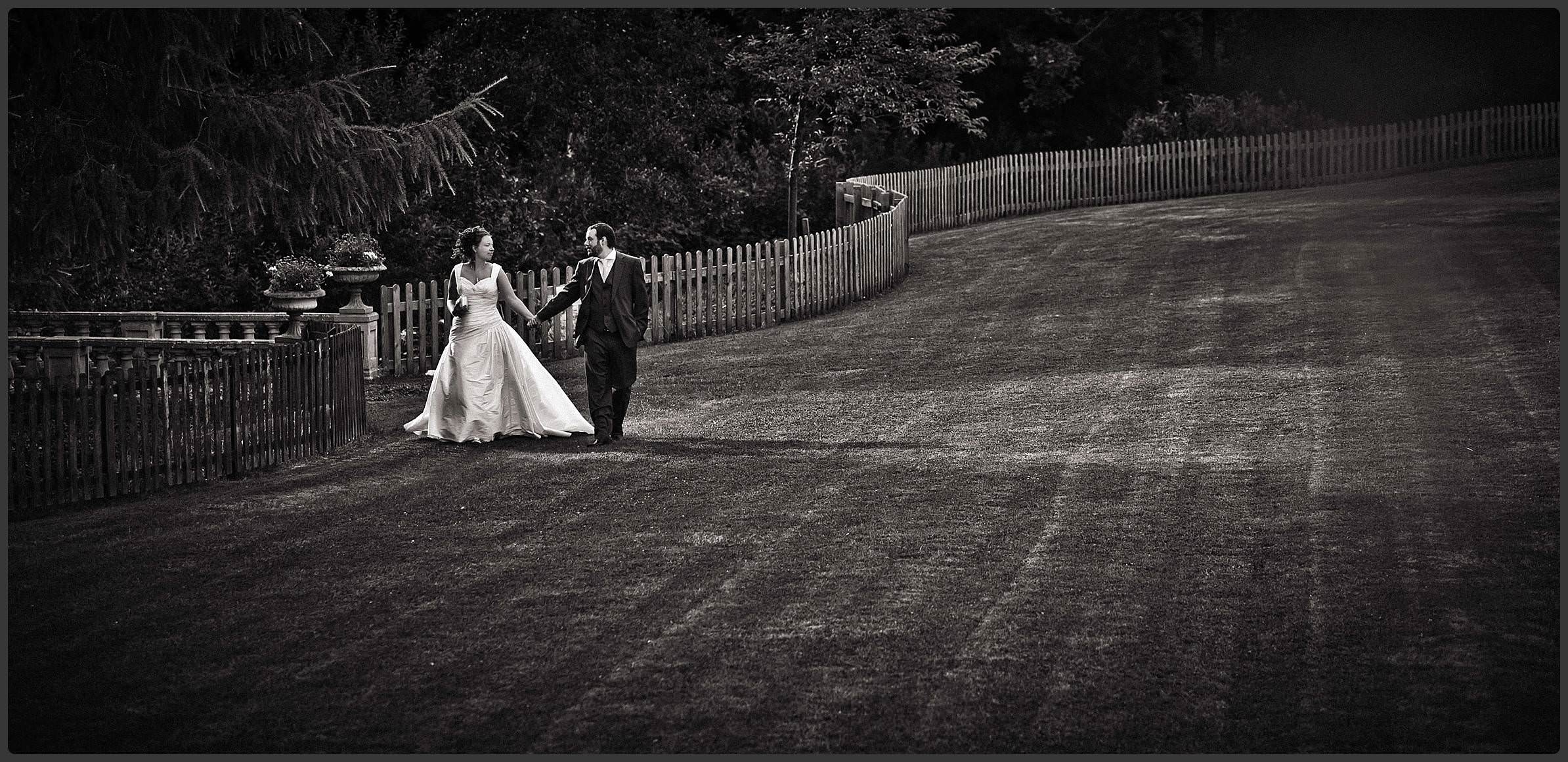 Bride and groom exploring the grounds at the Pittville Pump room hotel 6