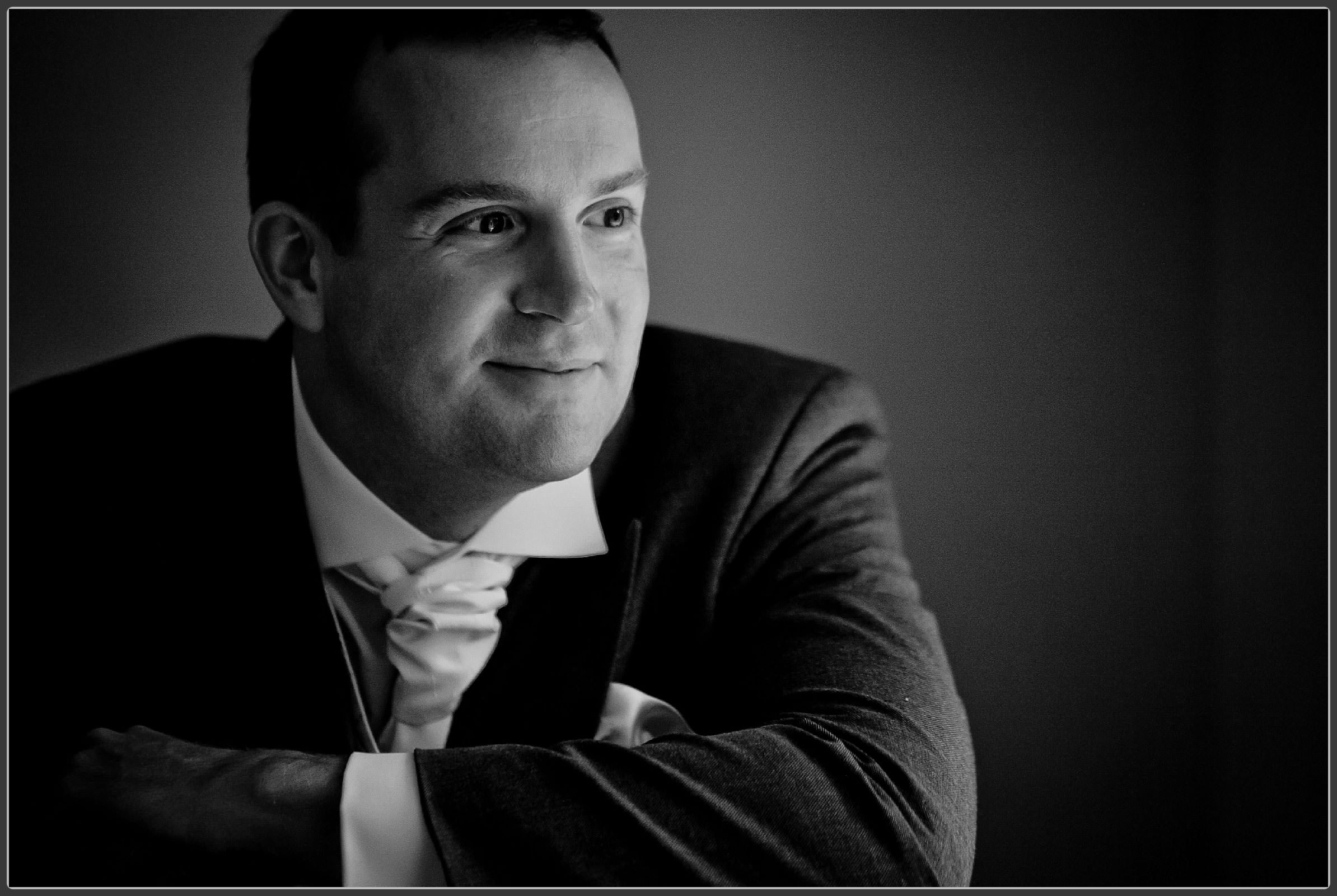 Black and white groom portrait