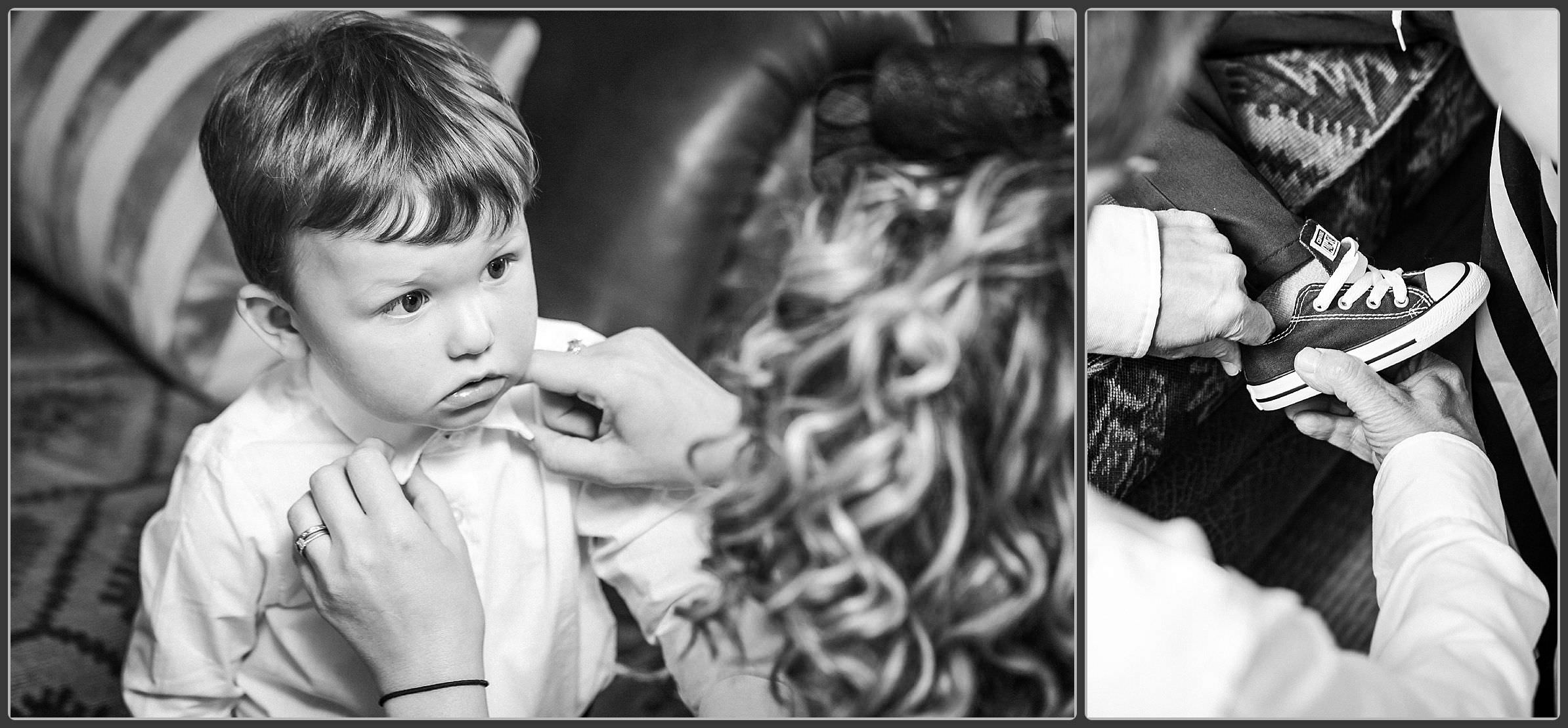 Brides son getting ready in black and white