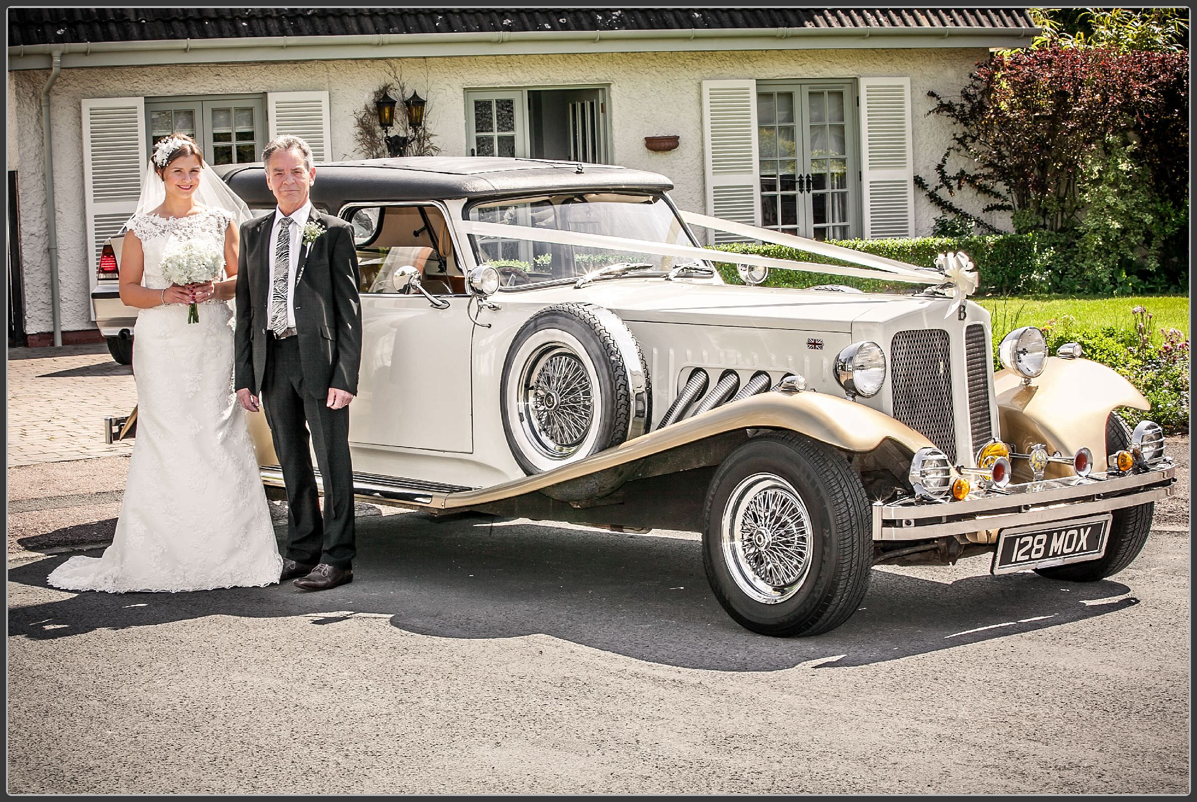 Bride and her father and the wedding car