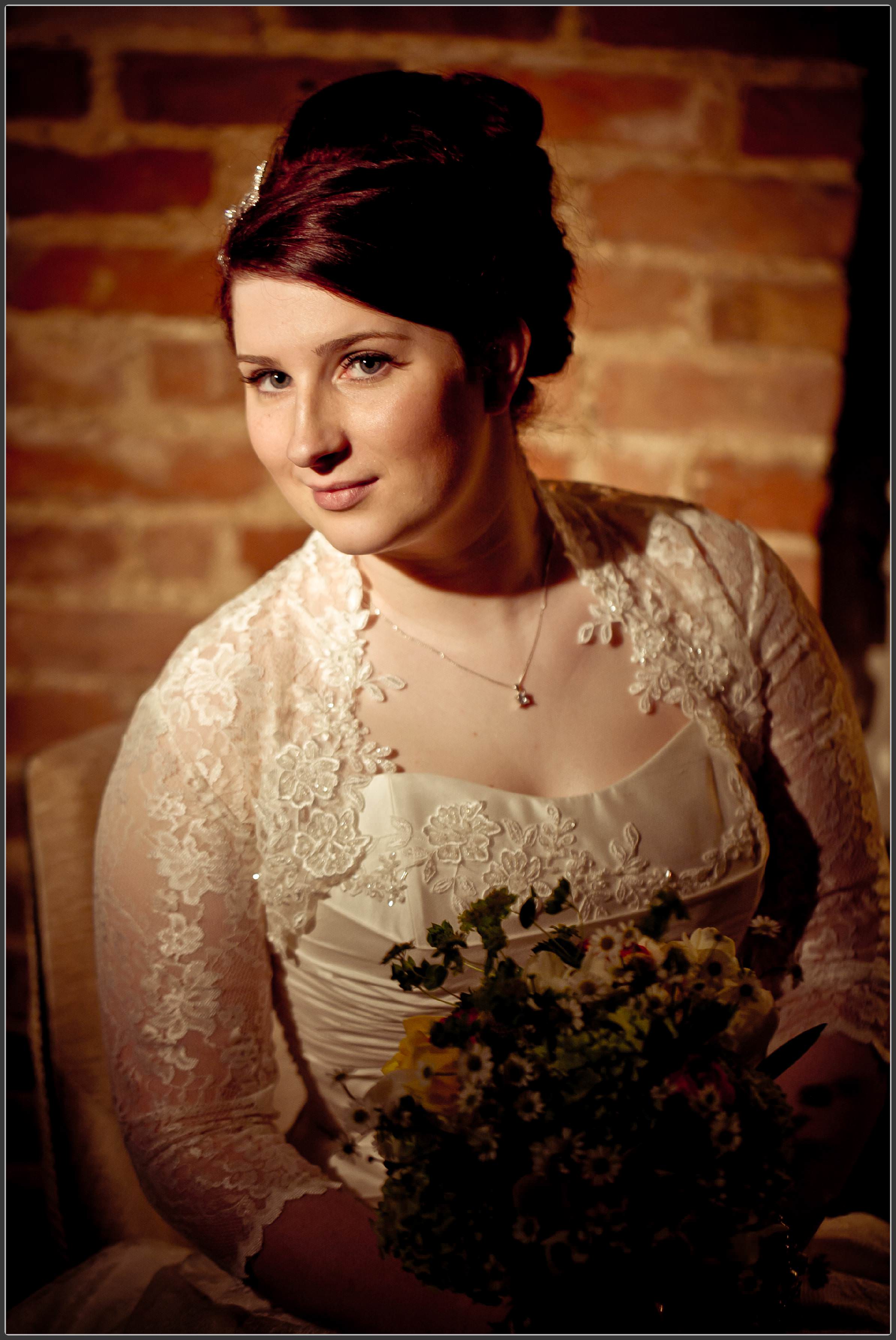 Bride getting ready at Mythe barn