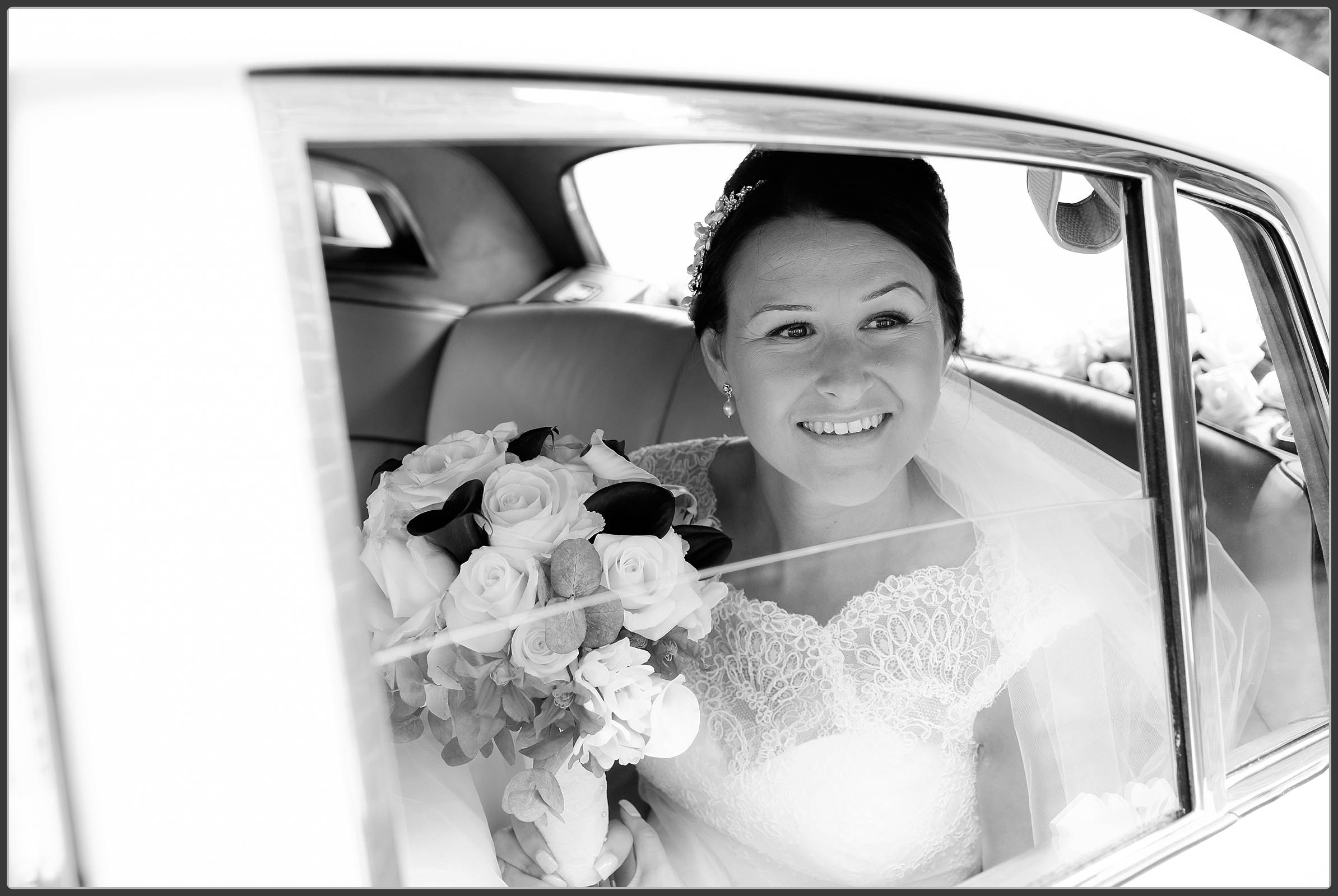 The bride arriving in her wedding car at Packington Moor