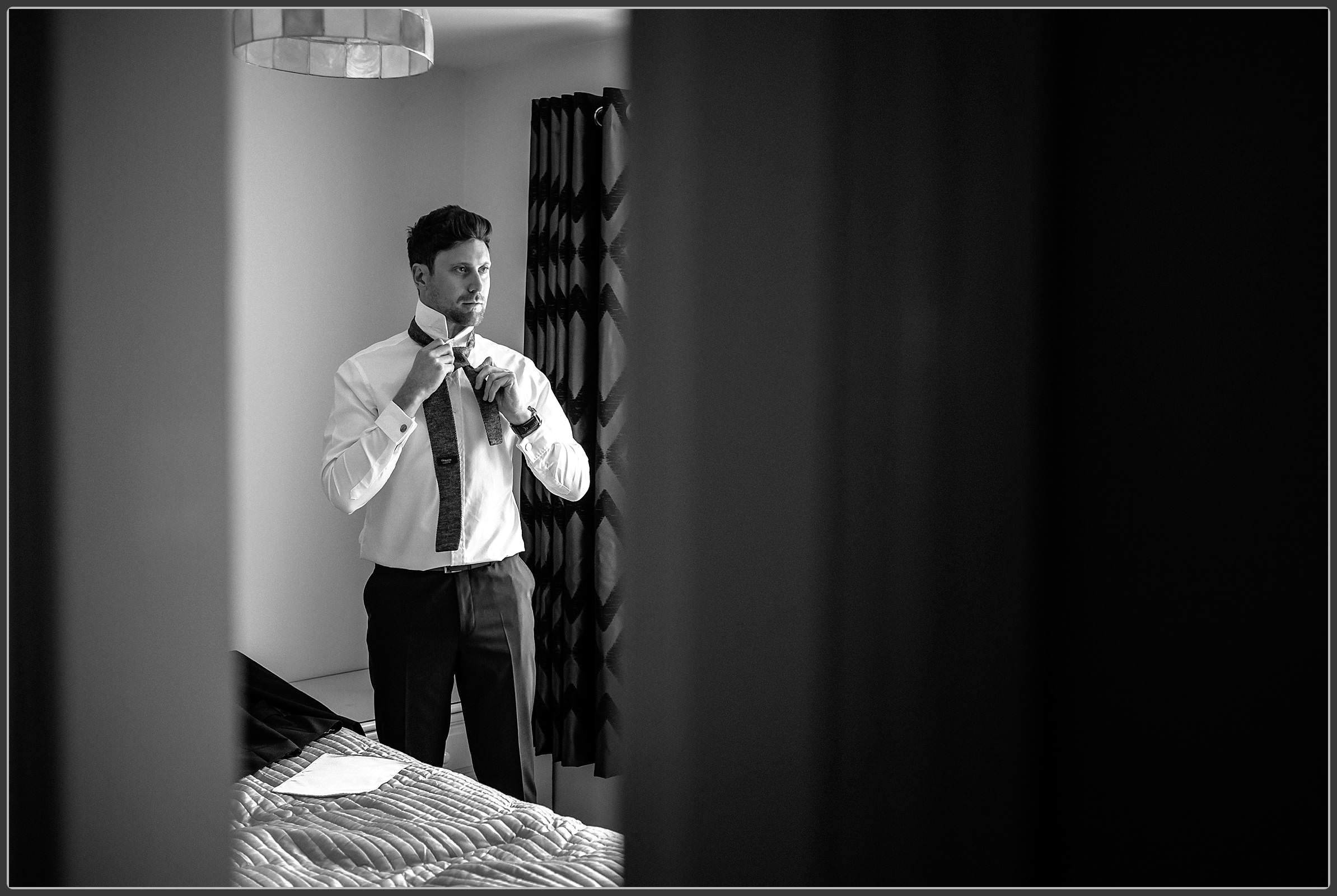 The groom getting dressed