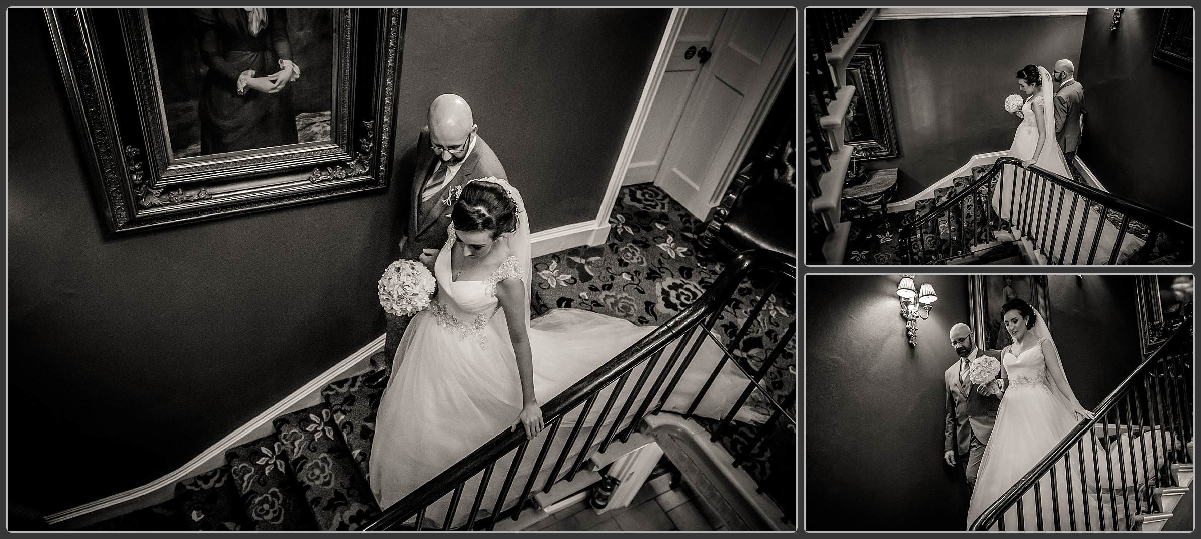 The bride and her father walking down the stairs