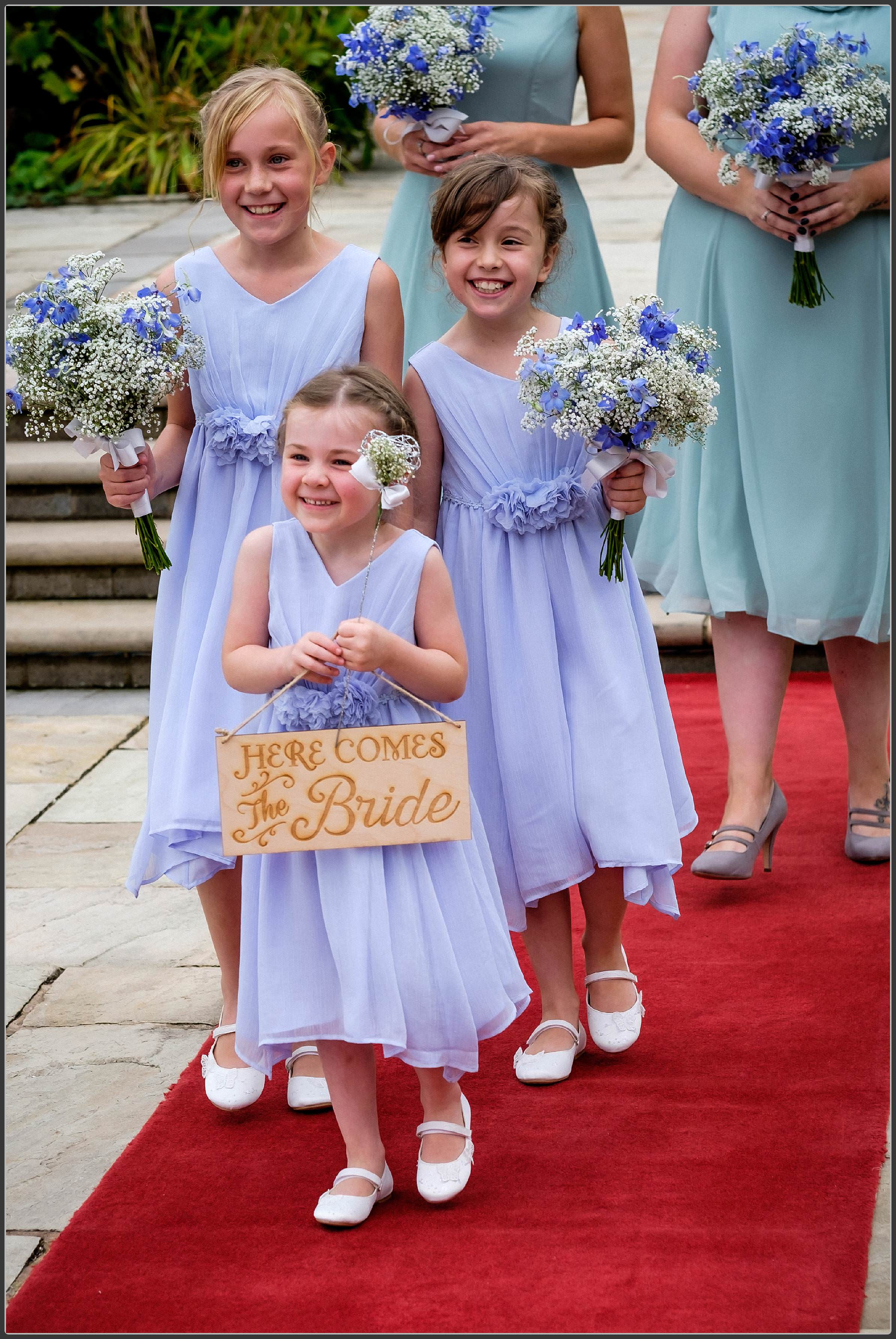 The bridal party walking towards the ceremony 2