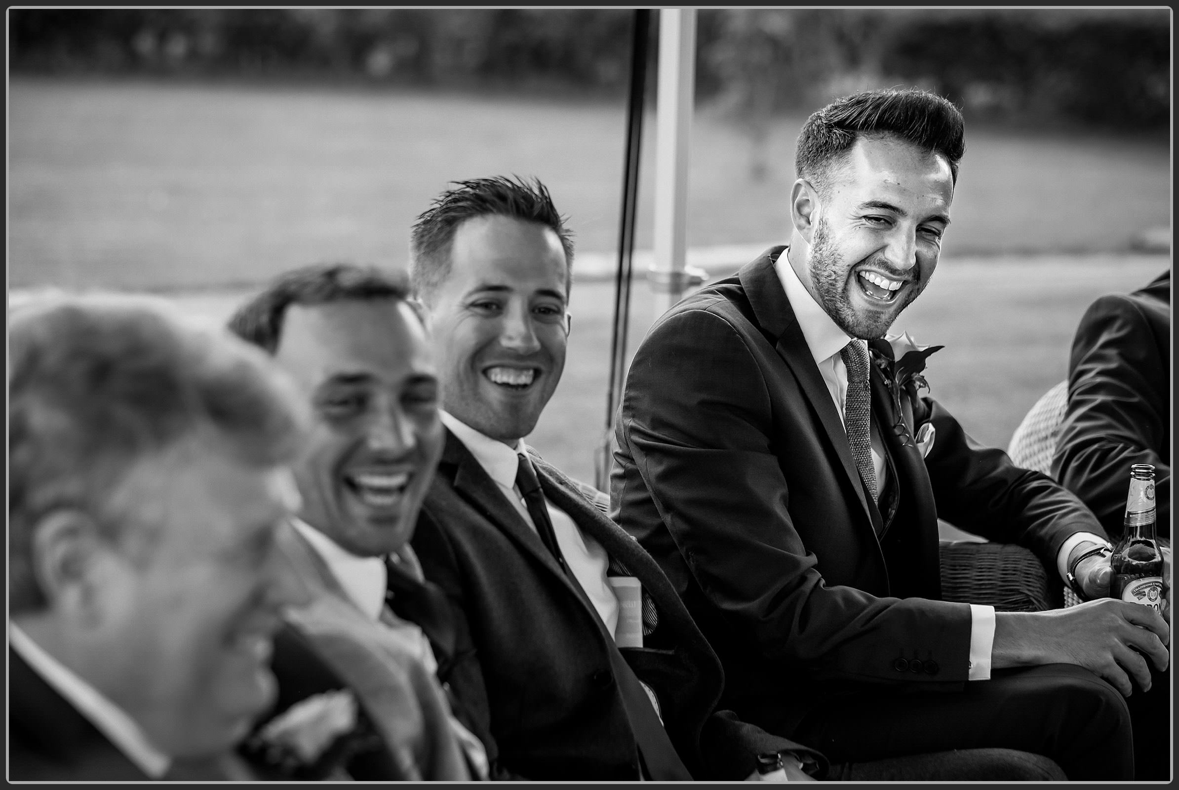 Wedding guests laughing