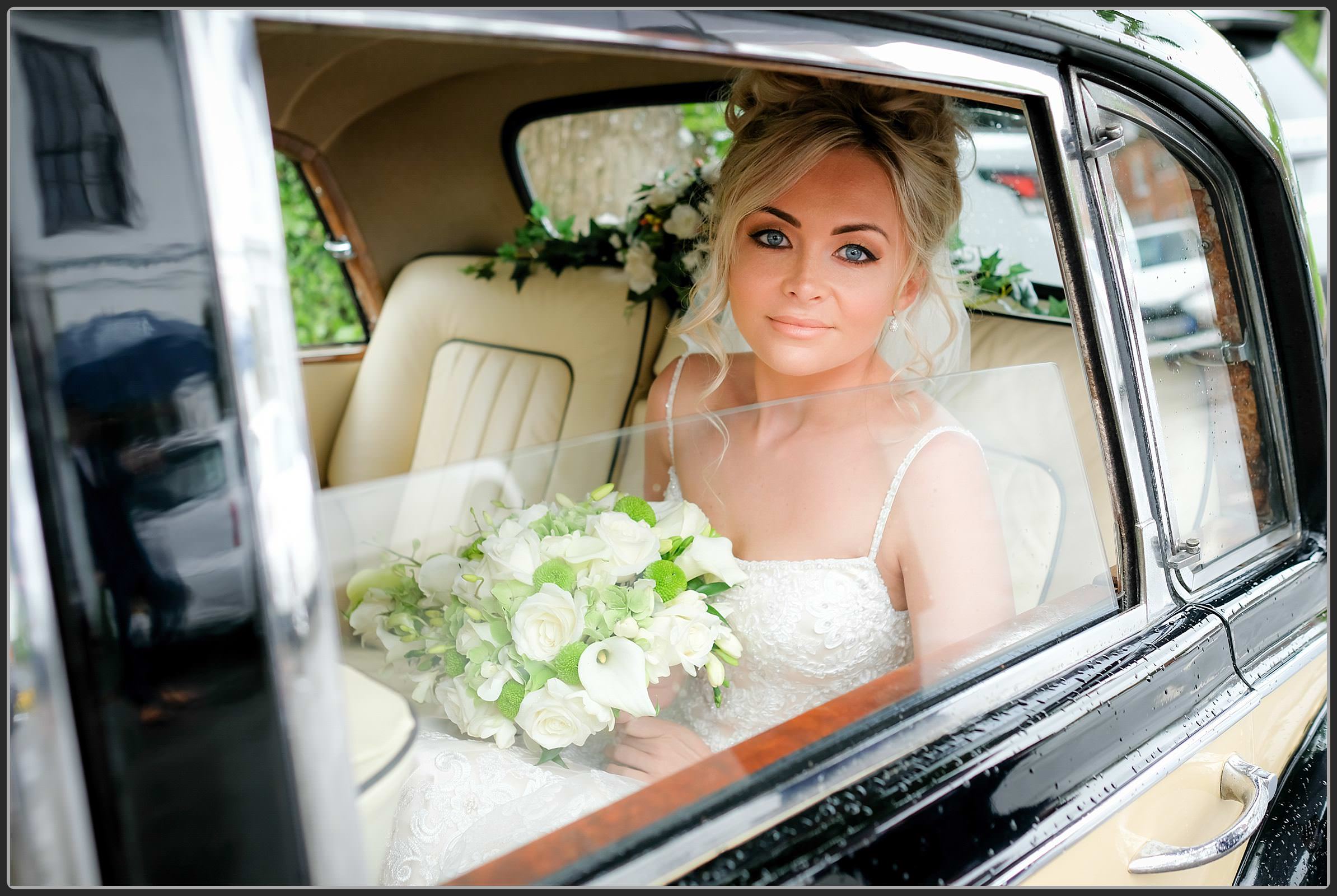 Bride in the wedding car