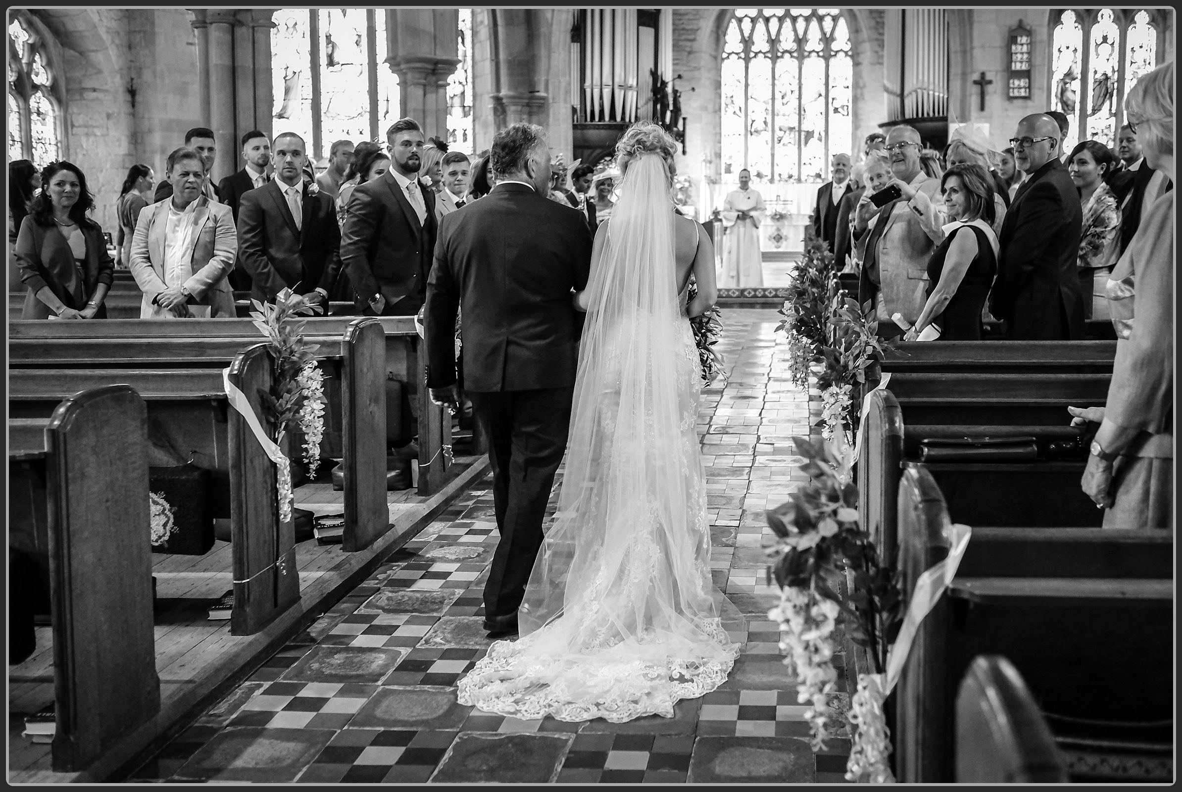 Bride and father at Tamworth in Arden church