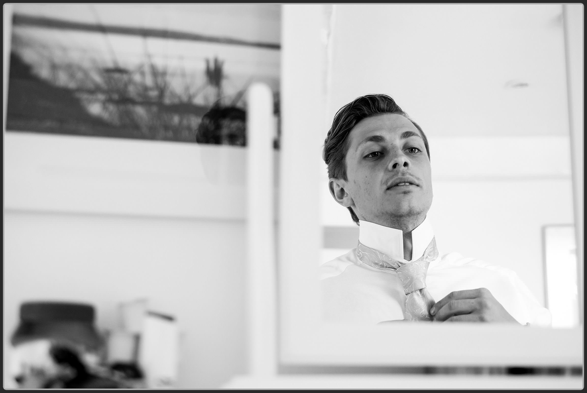 Groom in black and white