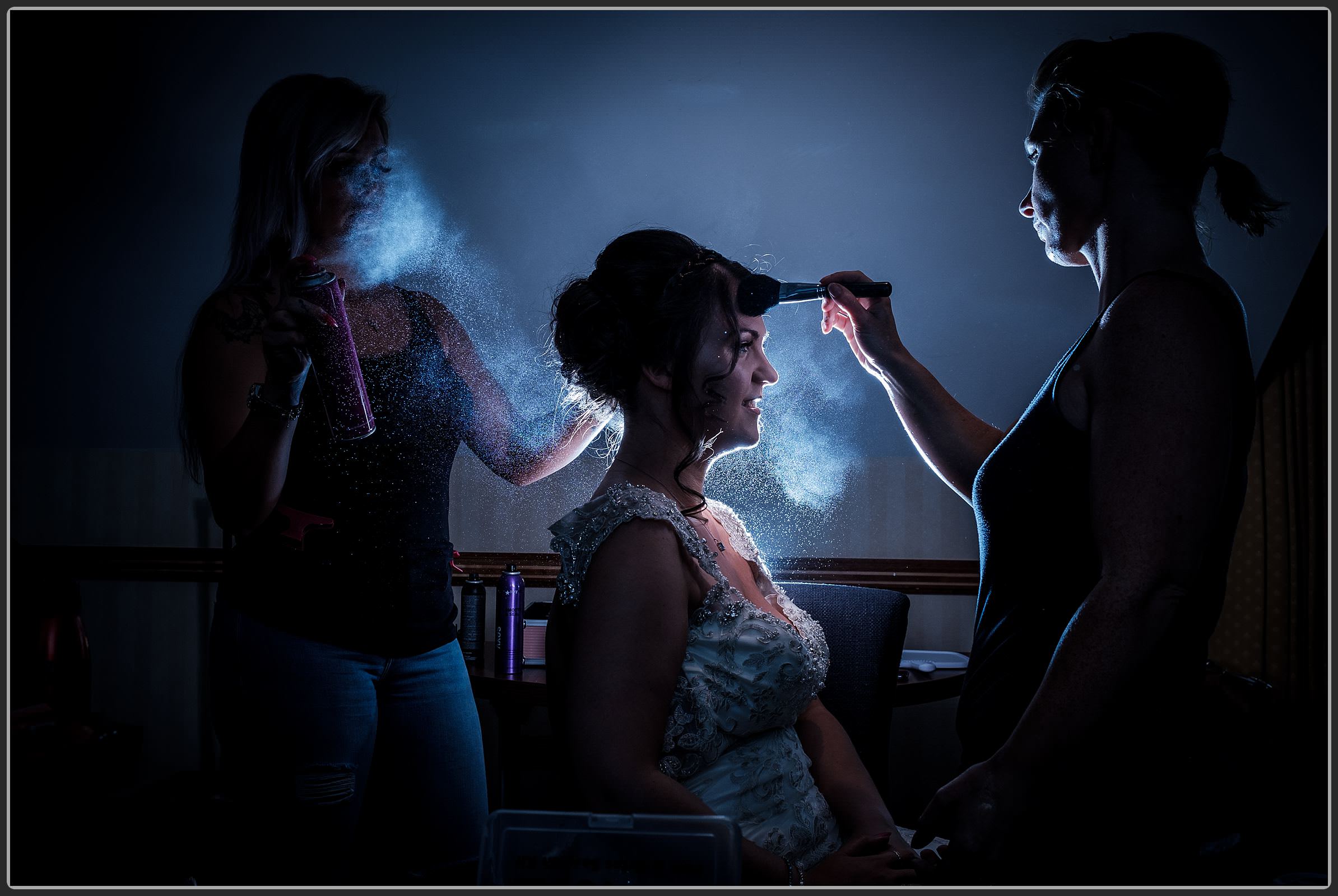 Bride having her hair and makeup done