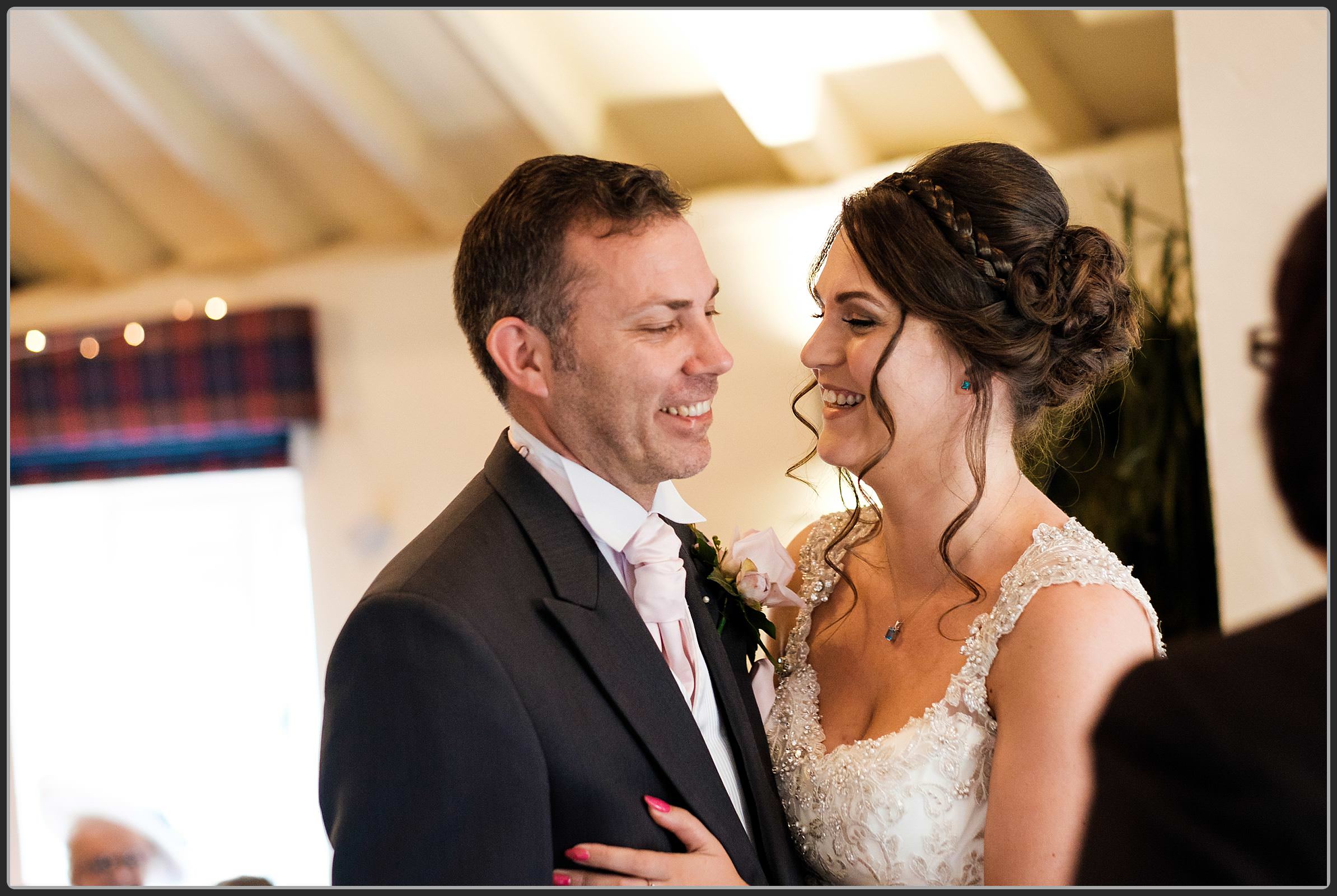 Bride and groom laughing