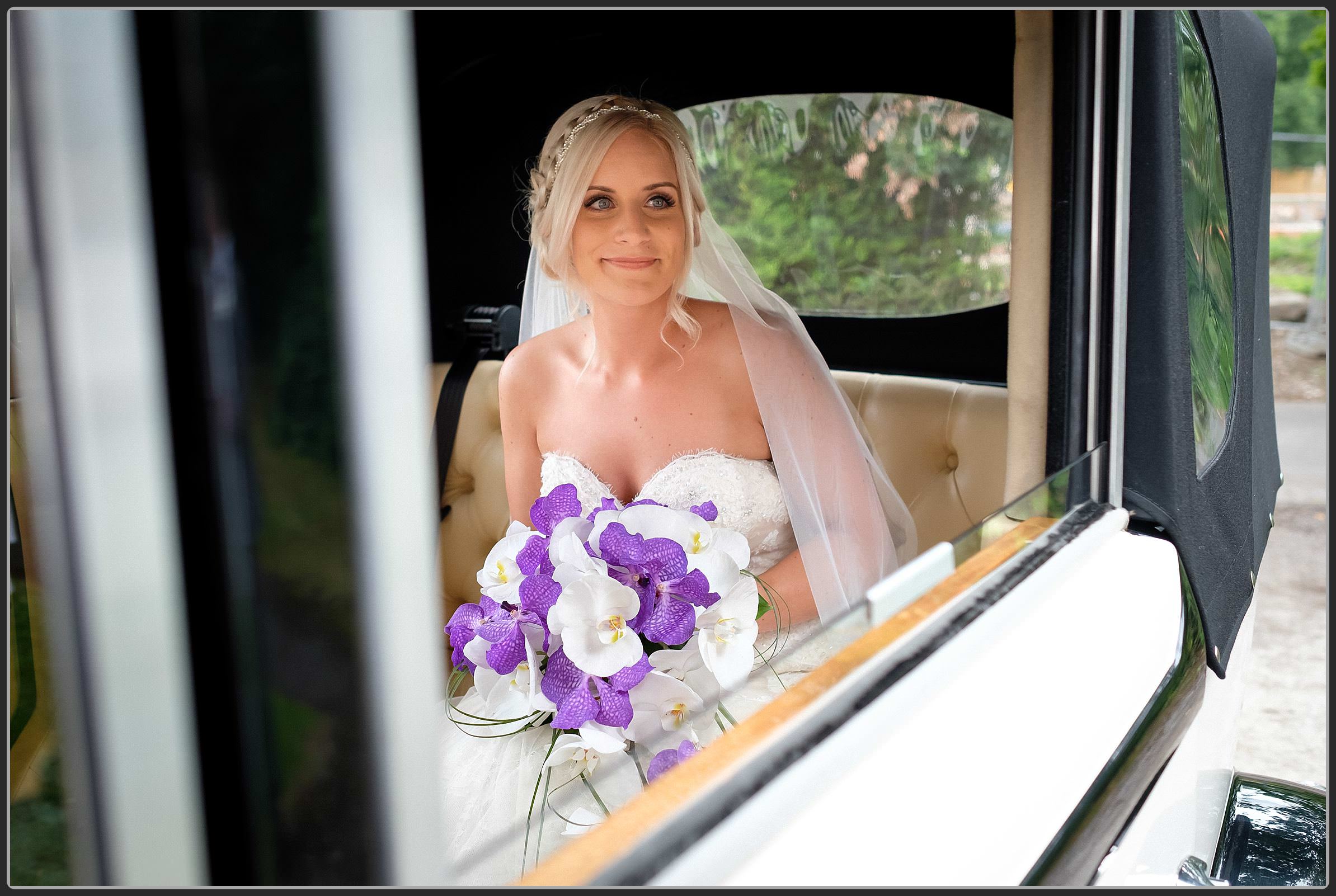 The bride in the wedding car