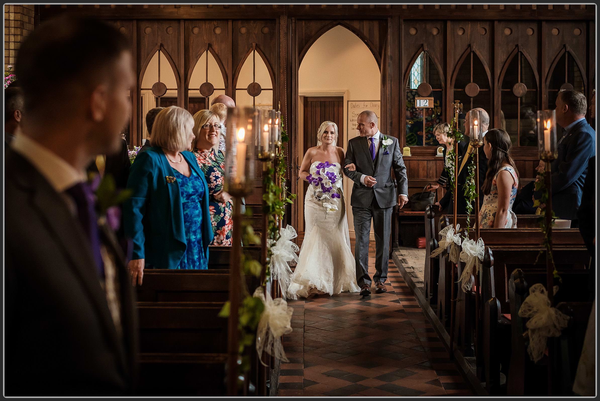 Bride and her father walking down the aisle