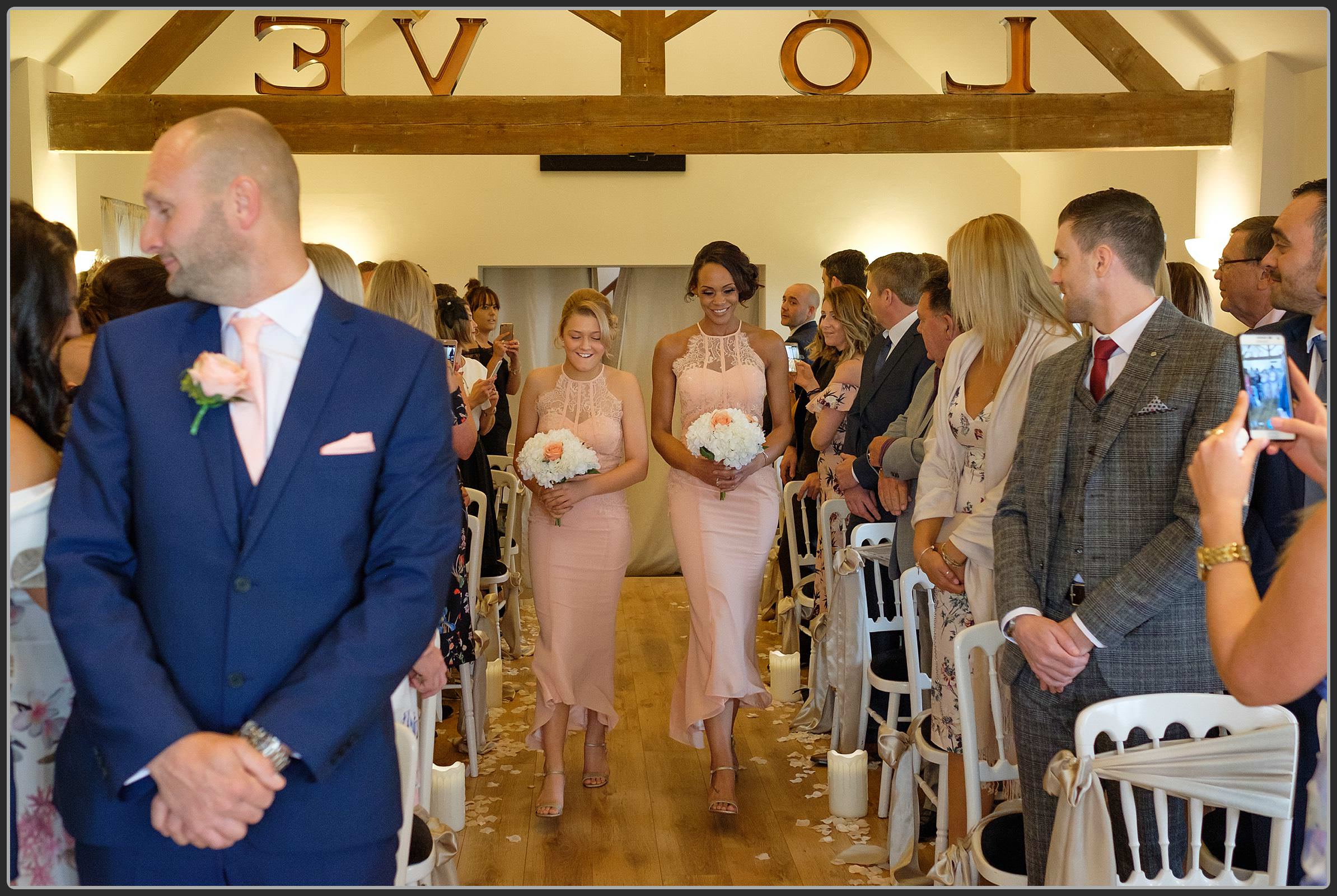 Bridesmaids entering the ceremony