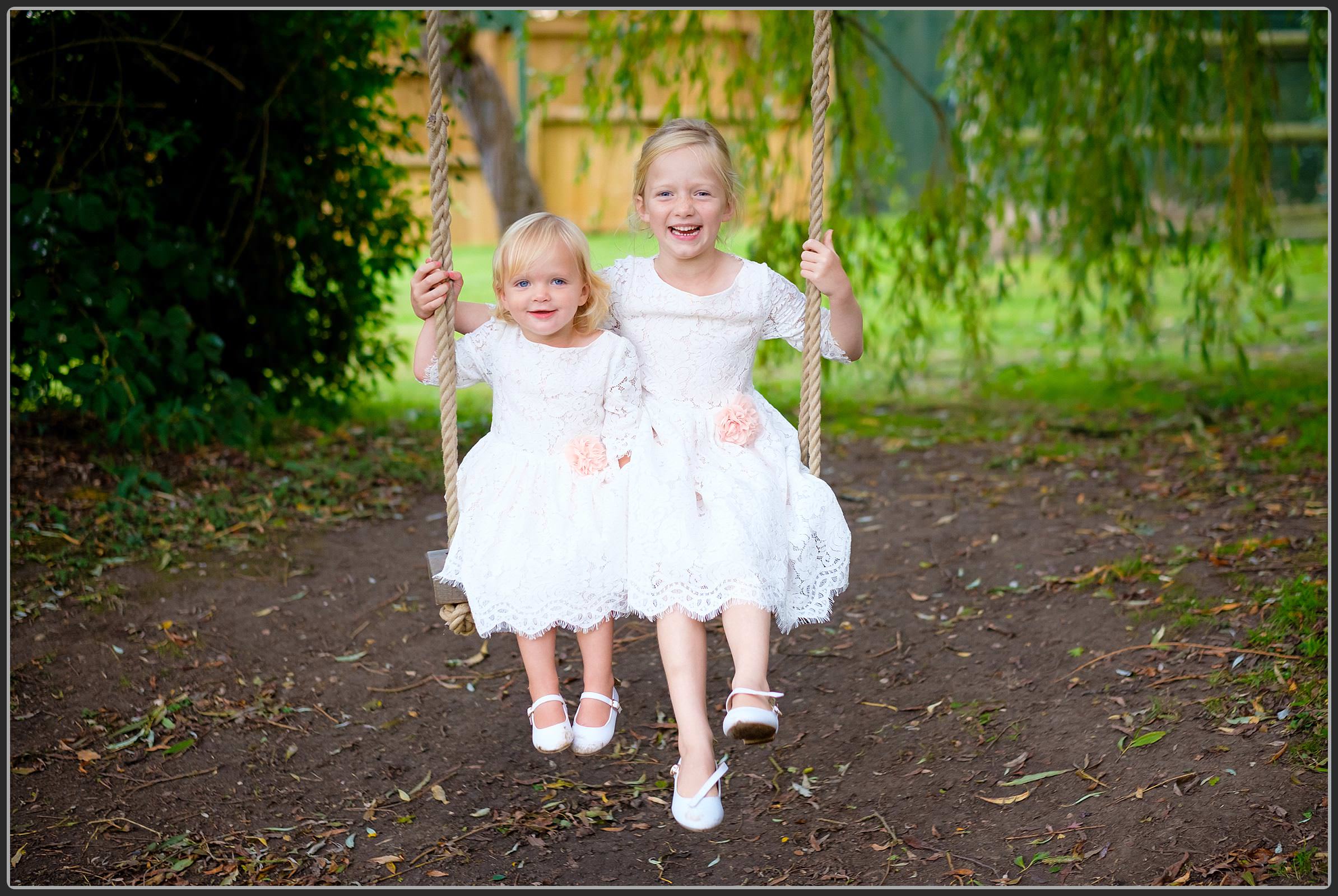 Flower girls on the swing at Bordesley Park Farm