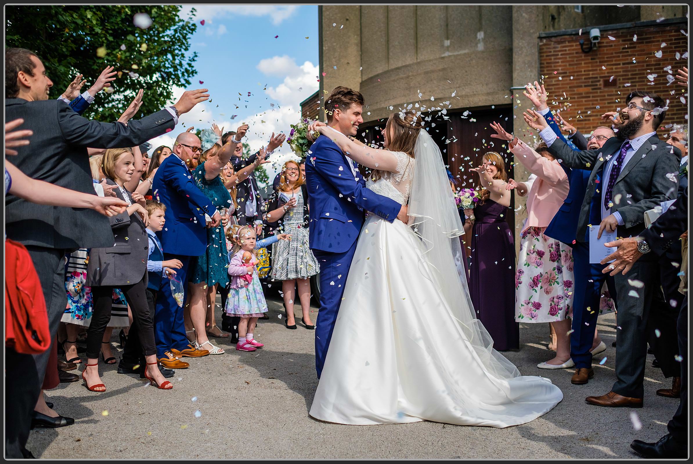 Throwing the confetti outside the St Peters Church