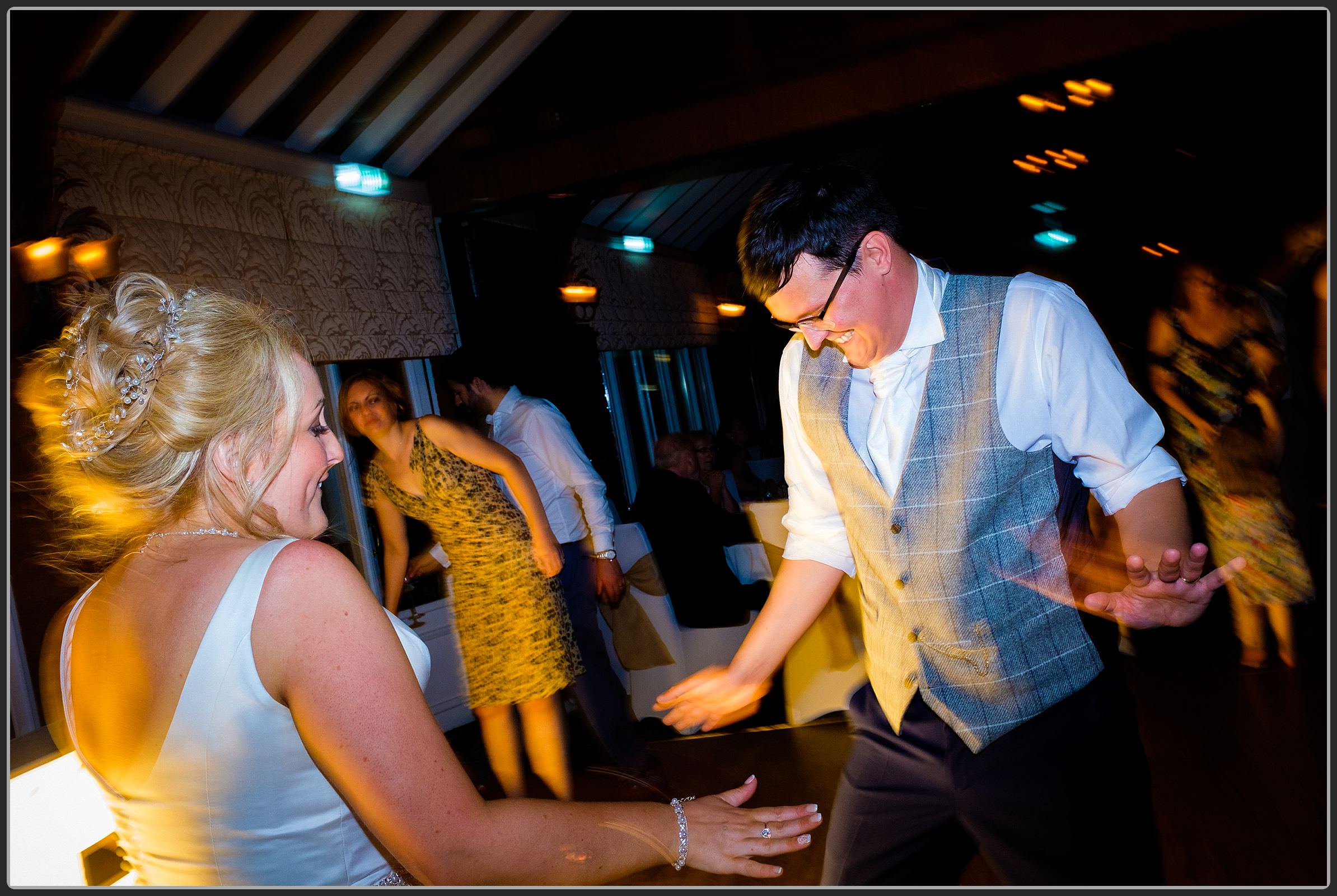 Bride and groom dancing