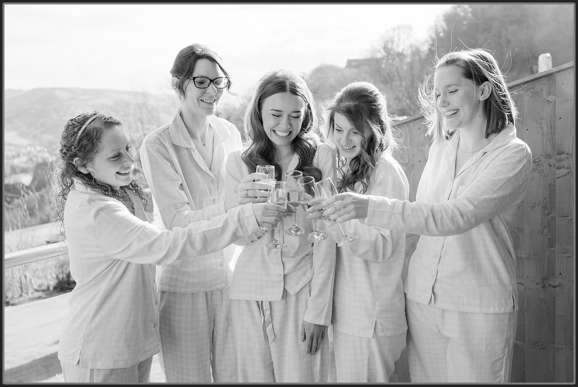 Bridesmaids drinking Champagne