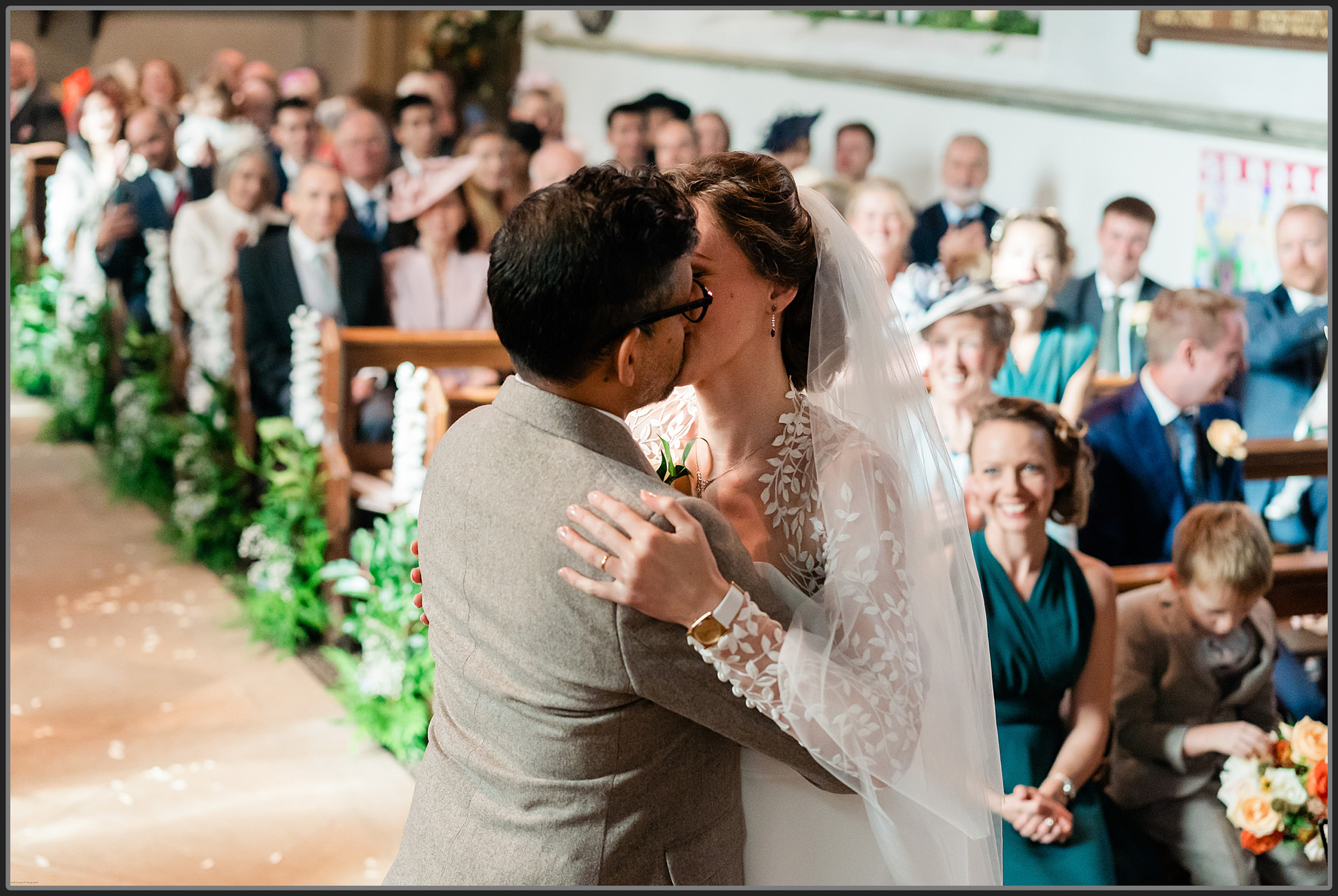 Bride and groom's first kiss