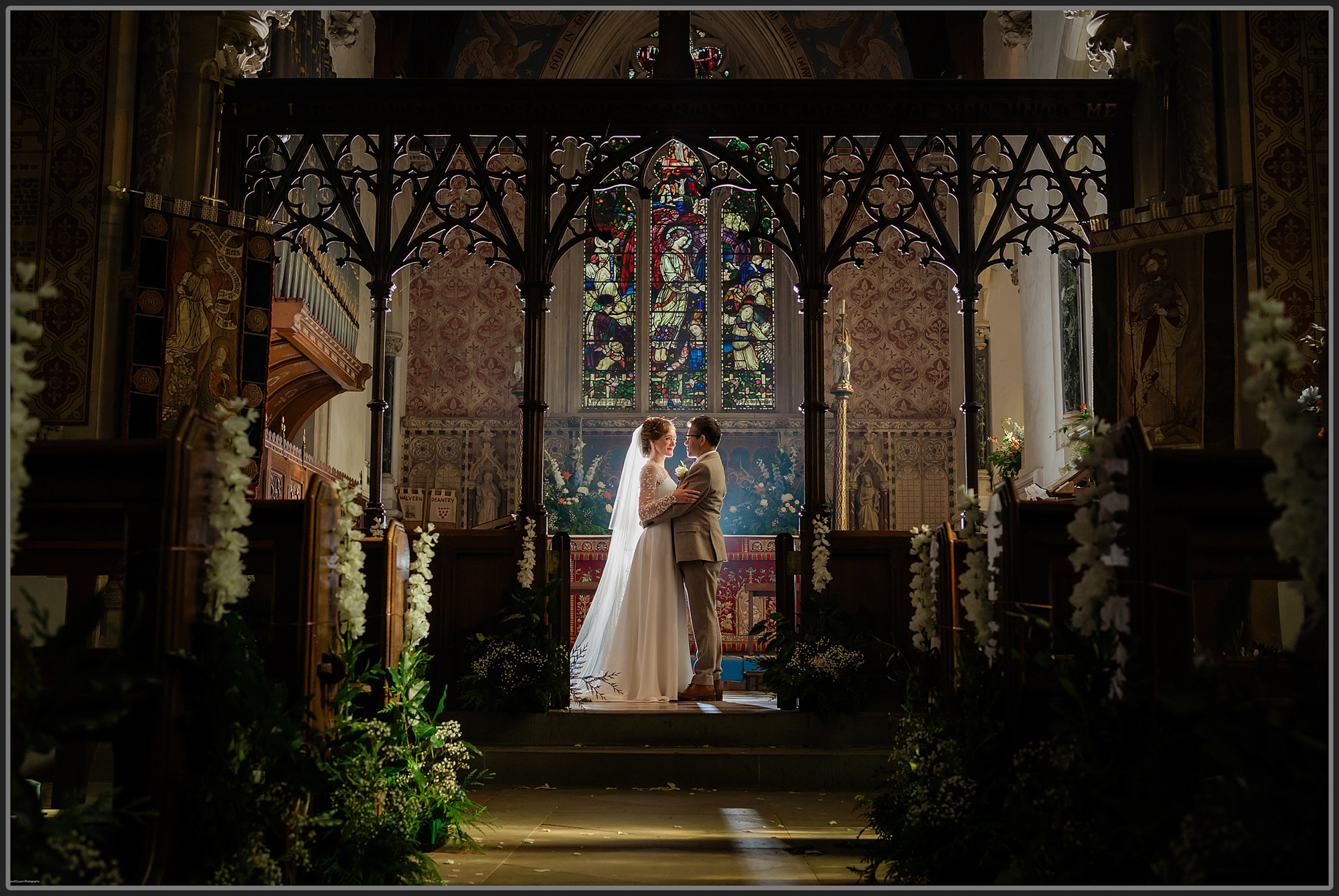 Photo of the bride and groom in the church