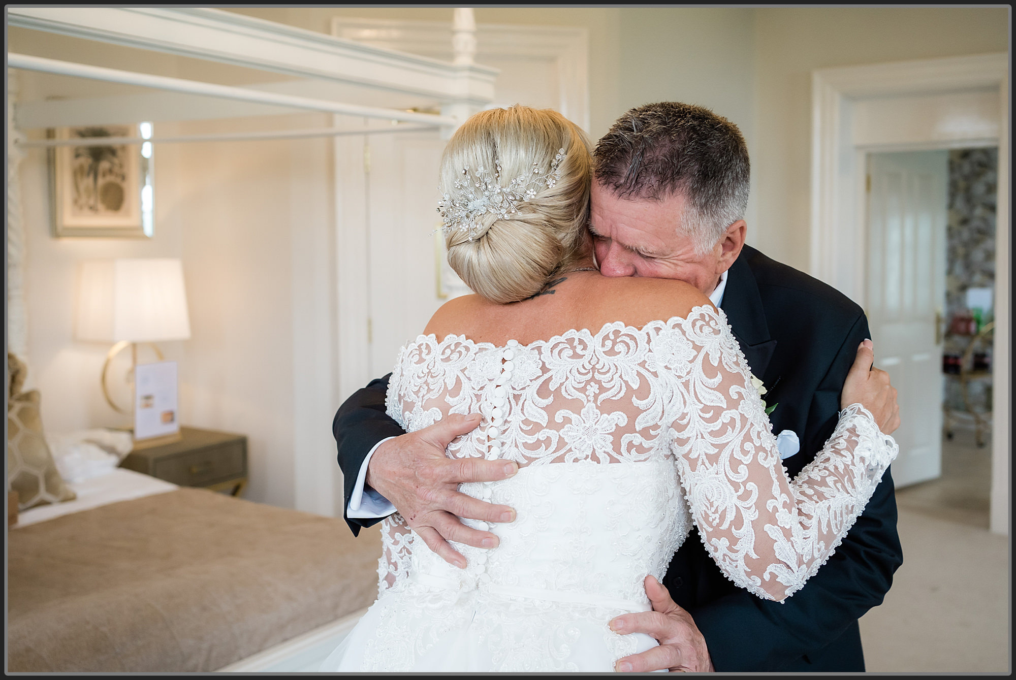 The dad hugging the bride