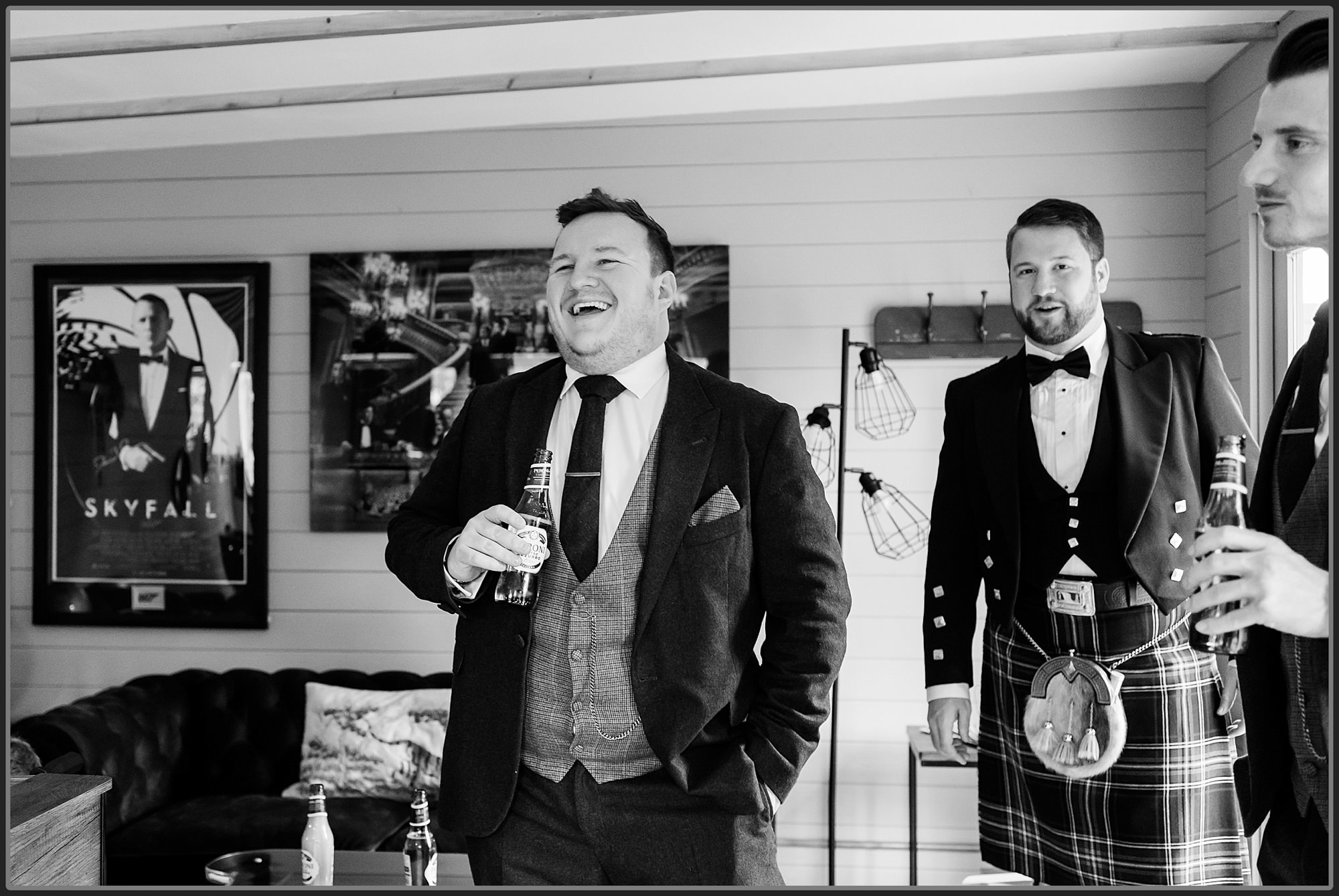 Groomsmen laughing at Moxhull Hall Hotel