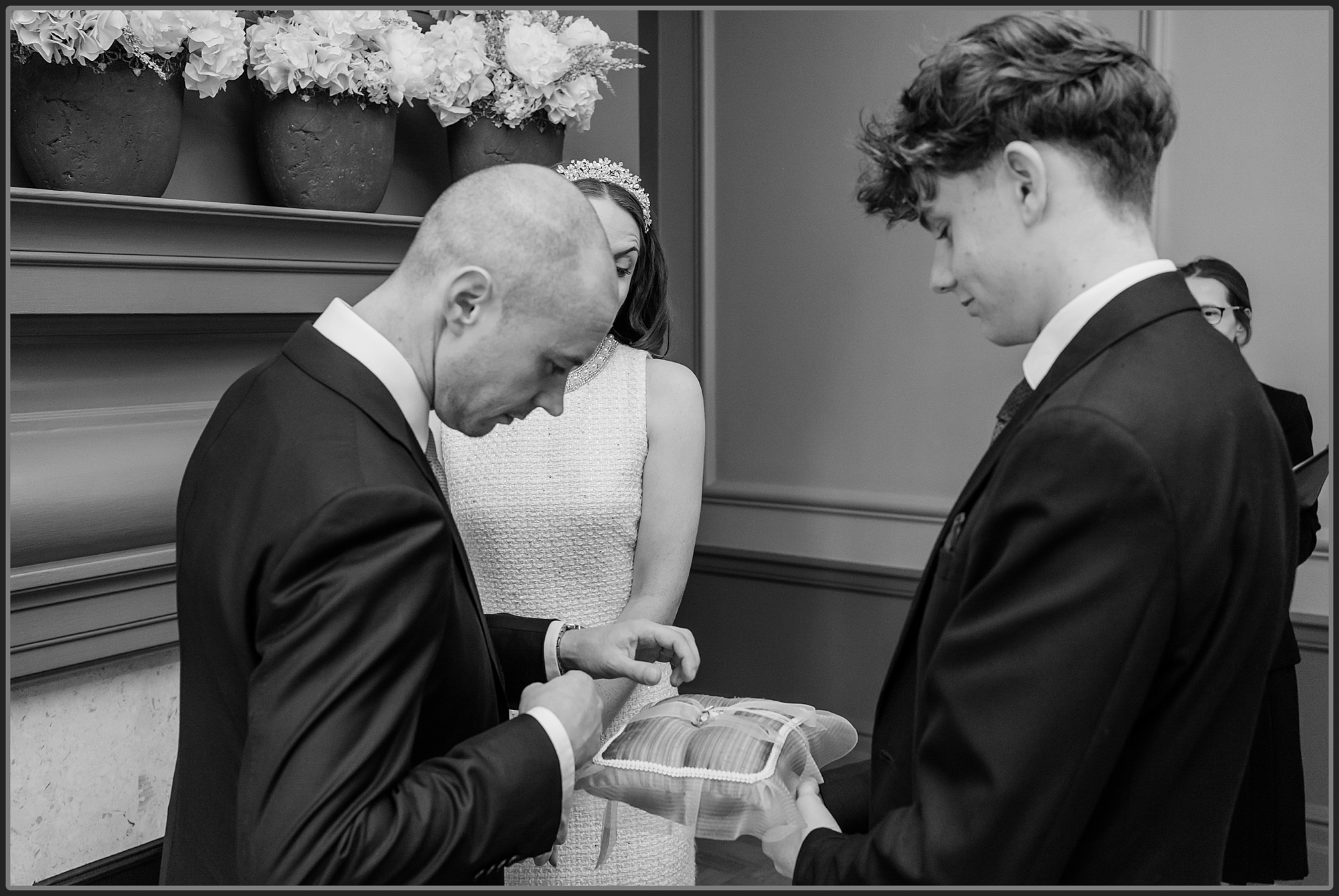 The Groom taking the wedding rings